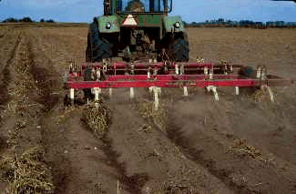 Listing of sandy soil reduces wind erosion.