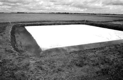 Figure 5. Plastic cover to reduce dugout evaporation losses 